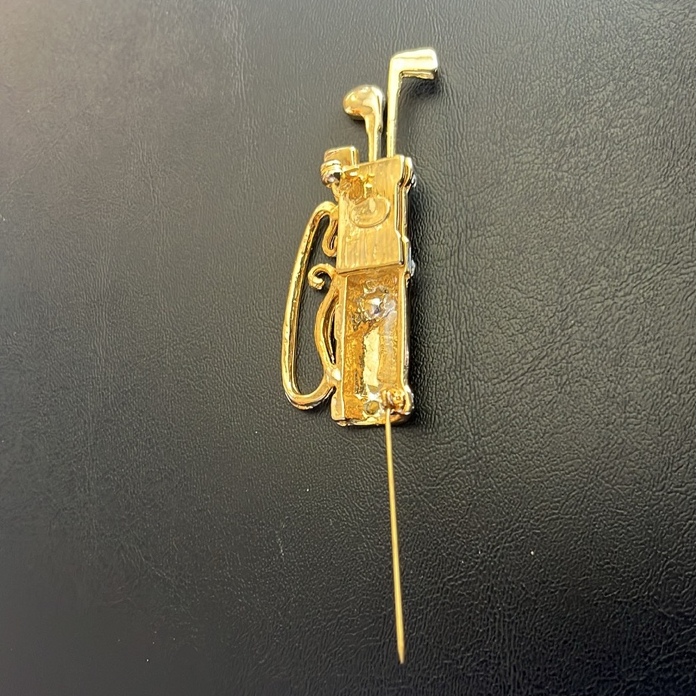 Vintage Golf Bag Brooch Pin
Gold Tone Clubs with Crystals on Black Enamel Bag - Picture 4 of 5